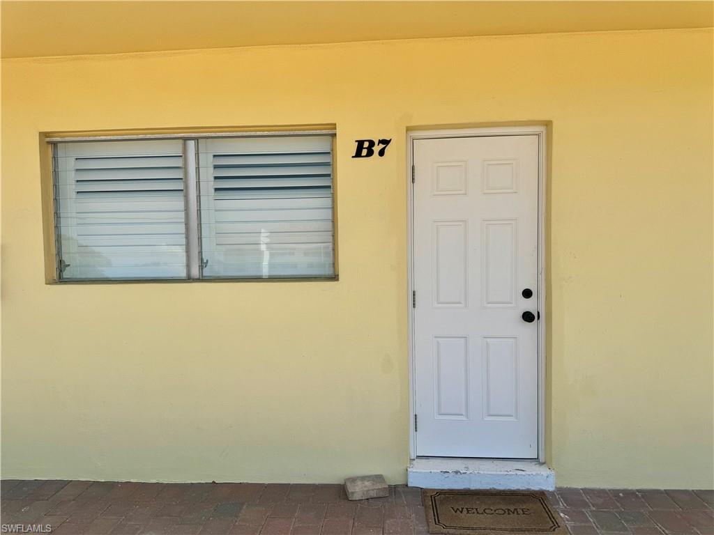 473 12th Avenue South, Unit B7 Naples, FL 34102 - Photo 21 of 21 View of exterior backside entry