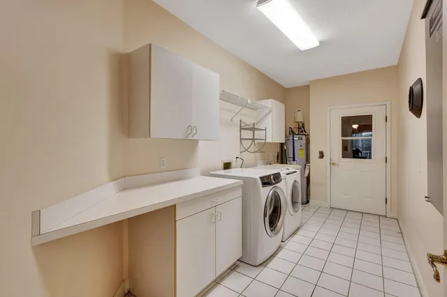 a bedroom with a bed and a television on desk