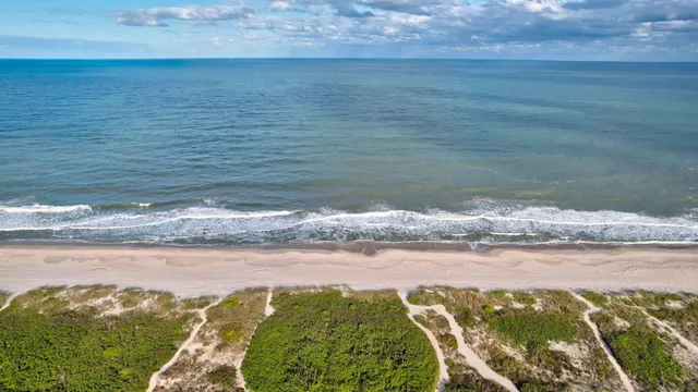 a view of a house with a roof deck