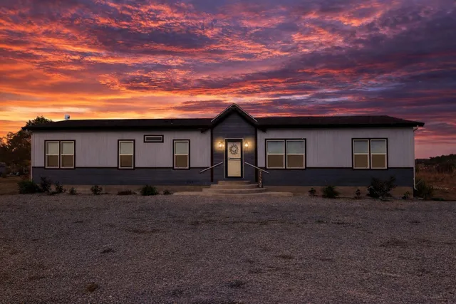 a view of house with outdoor space