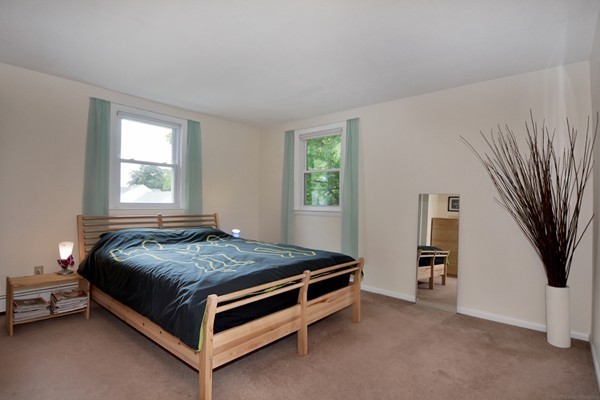7-9 Sparkill Street Watertown, MA 02472 - Photo 20 of 27 a bedroom with a bed and a window