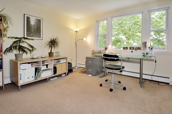 7-9 Sparkill Street Watertown, MA 02472 - Photo 23 of 27 a view of a workspace with furniture and a window