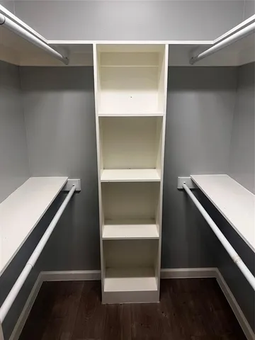 a view of an empty walk in closet