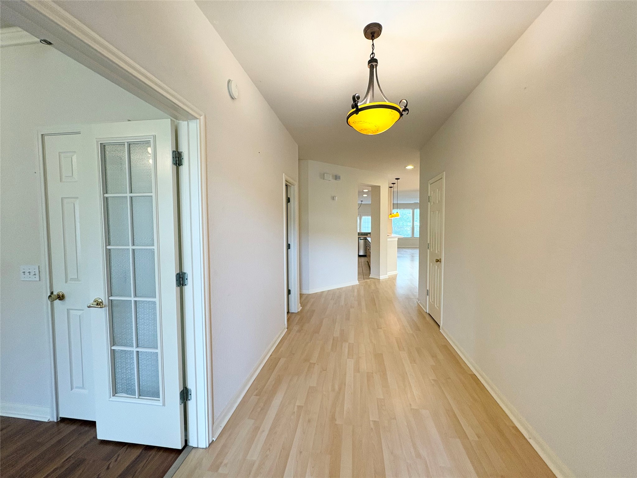 7006 Rambollet Terrace Round Rock, TX 78681 - Photo 4 of 38 A graceful entry hall welcomes you with polished hardwood floors and a warm, inviting ambiance.