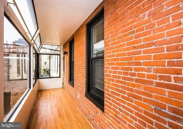 a kitchen with a sink a refrigerator and a stove