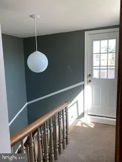 a kitchen with a sink a stove and refrigerator