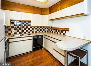 a backyard of a house with outdoor seating