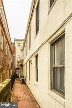 a bathroom with a shower and a toilet