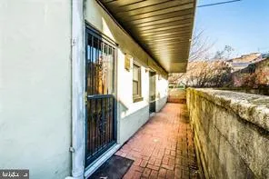 a view of entryway with a front door