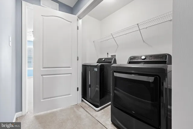 a kitchen with a stove and a microwave