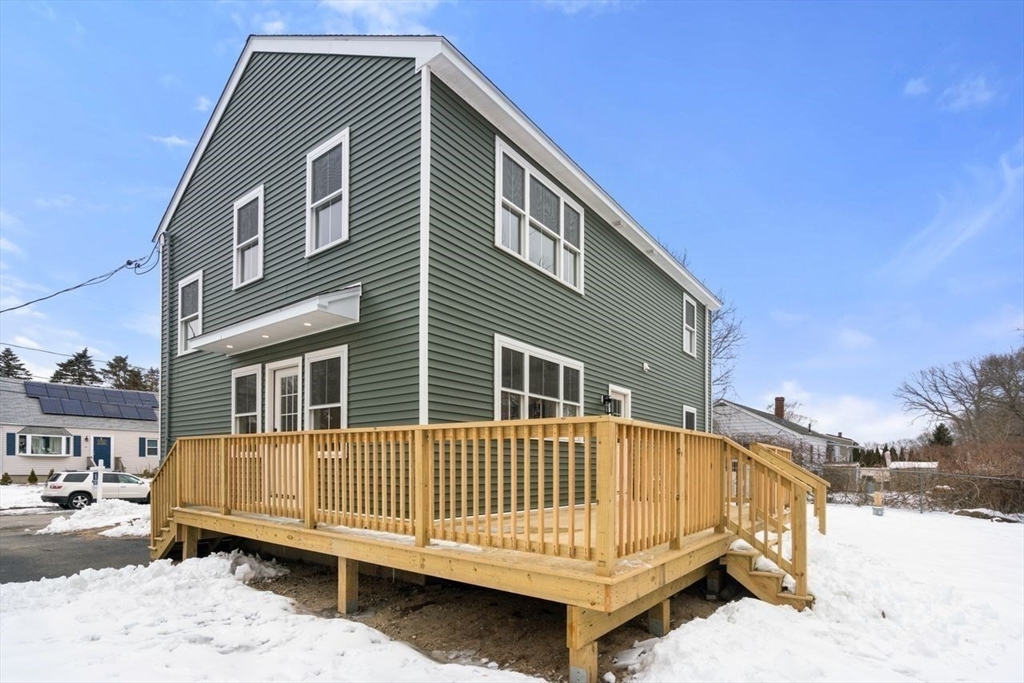 52 Freeman Street Avon, MA 02322 - Photo 15 of 17 a view of a house with a yard