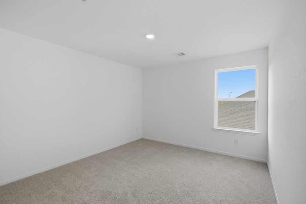 5607 Buttonbush Court Rosenberg, TX 77471 - Photo 15 of 37 an empty room with a window