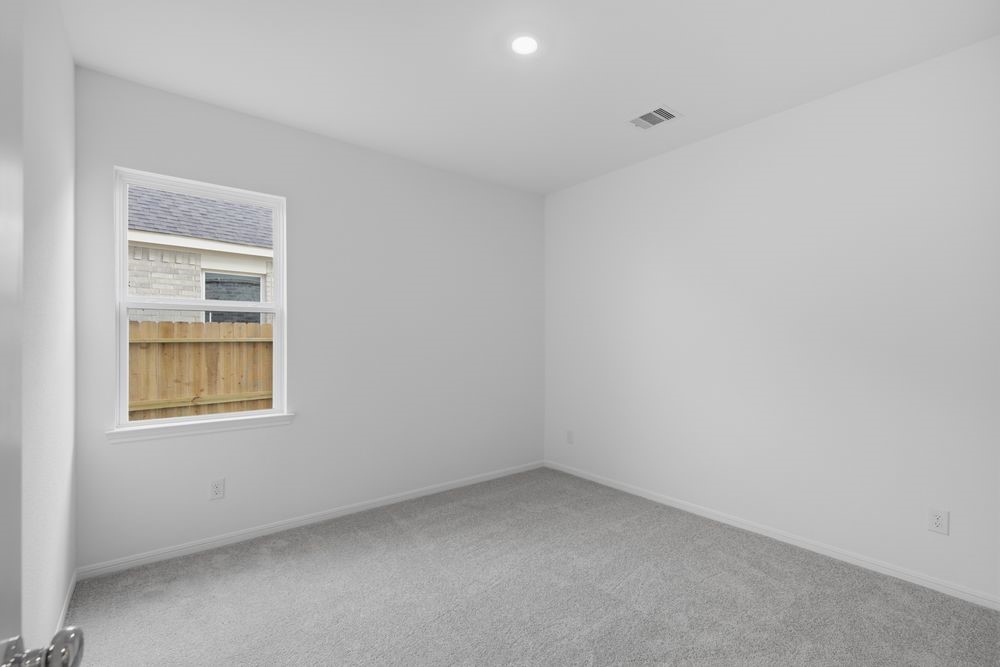 5607 Buttonbush Court Rosenberg, TX 77471 - Photo 16 of 37 an empty room with a window