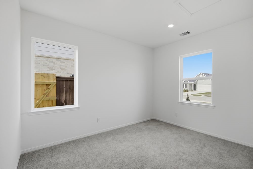 5607 Buttonbush Court Rosenberg, TX 77471 - Photo 17 of 37 an empty room with a window