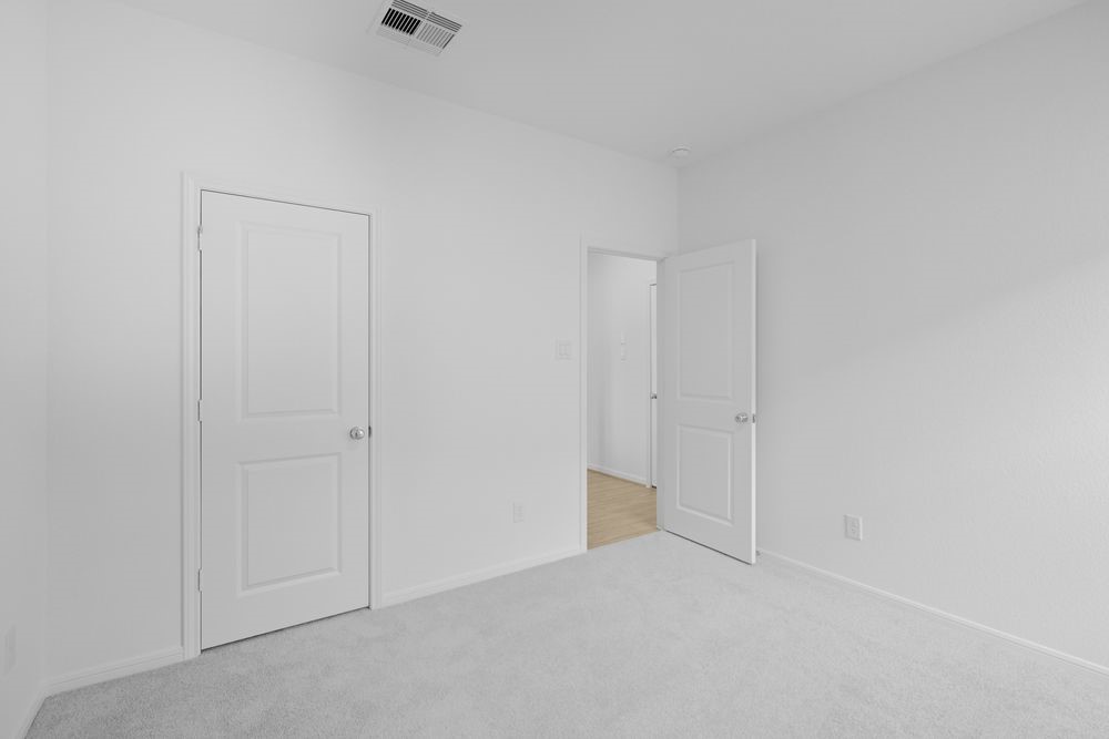 5607 Buttonbush Court Rosenberg, TX 77471 - Photo 19 of 37 a view of an empty room