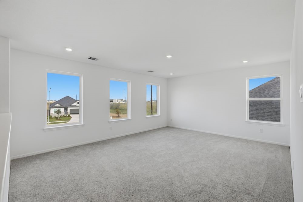 5607 Buttonbush Court Rosenberg, TX 77471 - Photo 20 of 37 an empty room with windows