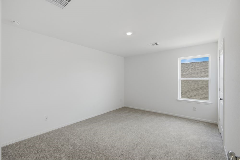 5607 Buttonbush Court Rosenberg, TX 77471 - Photo 21 of 37 an empty room with a window