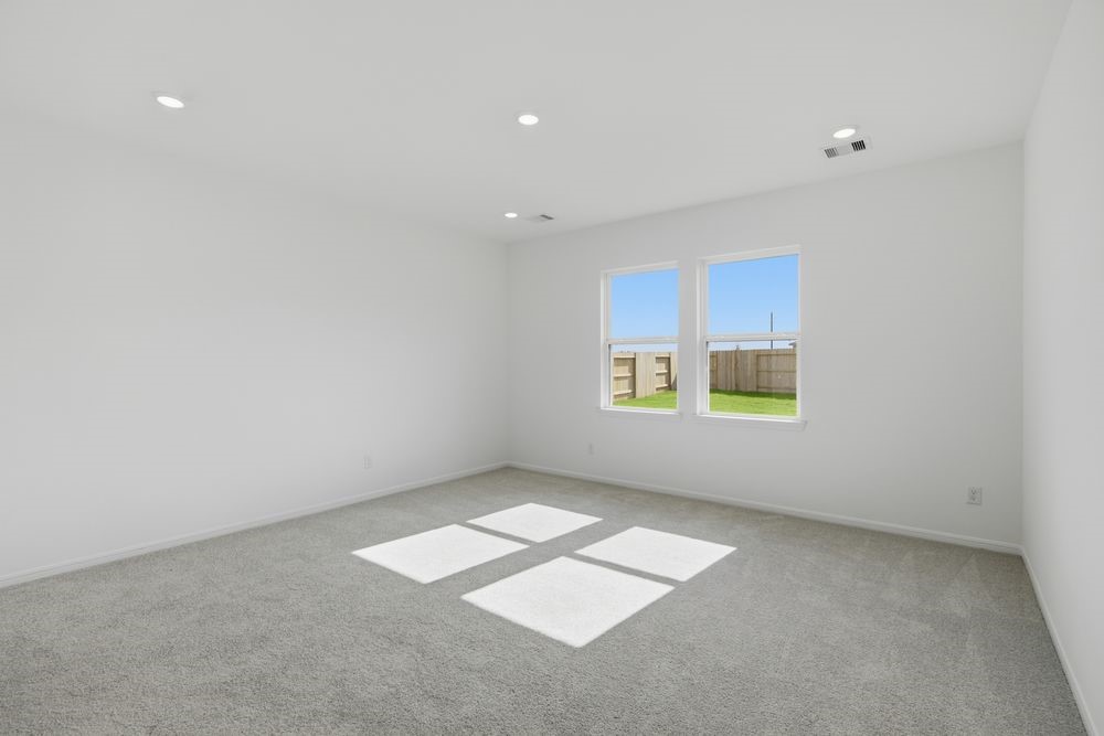 5607 Buttonbush Court Rosenberg, TX 77471 - Photo 24 of 37 an empty room with windows