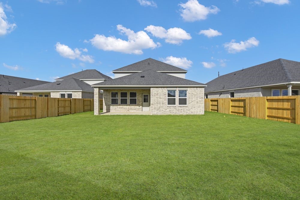 5607 Buttonbush Court Rosenberg, TX 77471 - Photo 29 of 37 a front view of a house with a garden