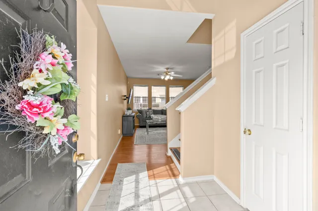 a hallway with flowers and flowers