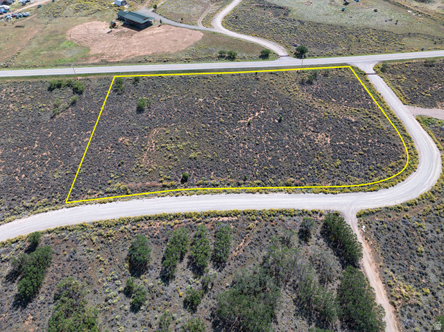 14 East Spring Draw Drive, Unit 13 La Sal, UT 84530 - Photo 1 of 17 Expansive undeveloped land featuring natural desert vegetation, defined by clear boundary lines