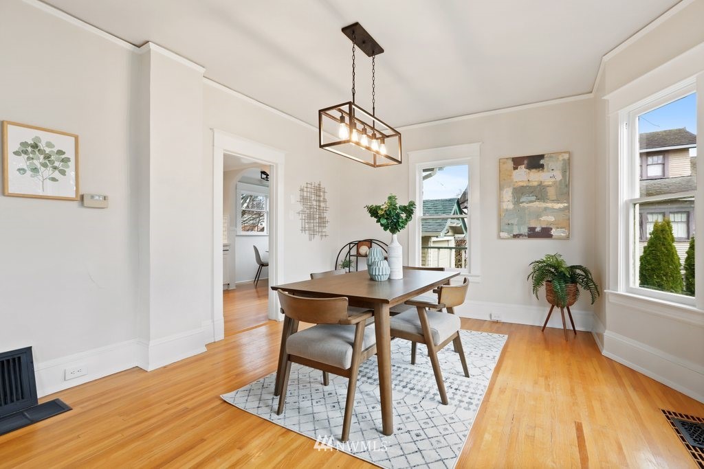 1631 Oakes Avenue Everett, WA 98201 - Photo 11 of 39 a view of a dining room with furniture and wooden floor