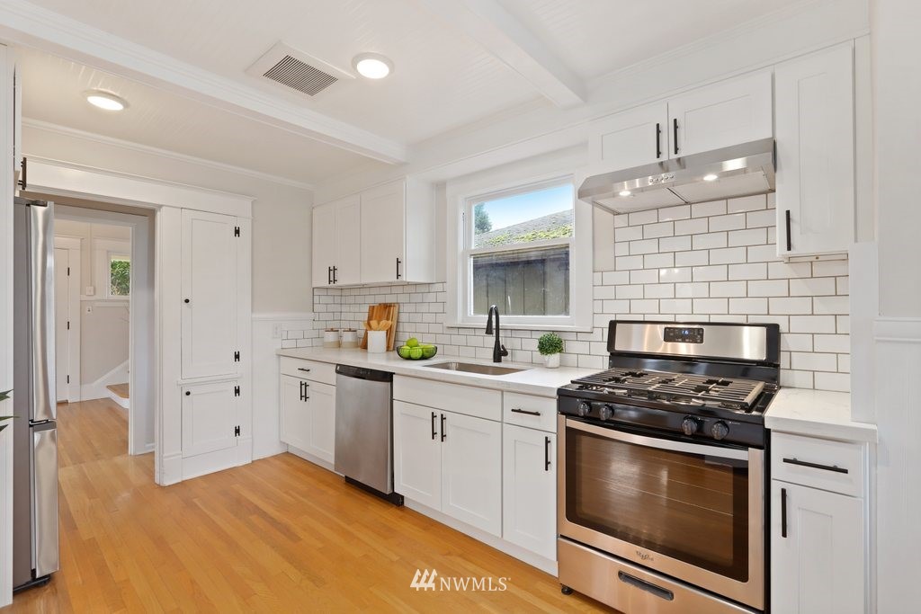 1631 Oakes Avenue Everett, WA 98201 - Photo 15 of 39 a kitchen with cabinets appliances and a window