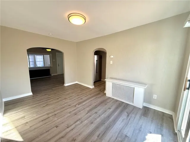 a view of a livingroom with wooden floor