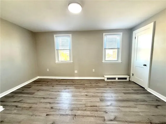 an empty room with window