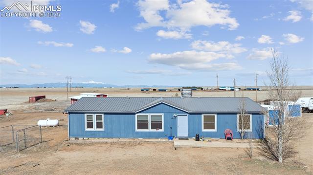 610 Awesome View Yoder, CO 80864 - Photo 3 of 20 View of front of home featuring metal roof