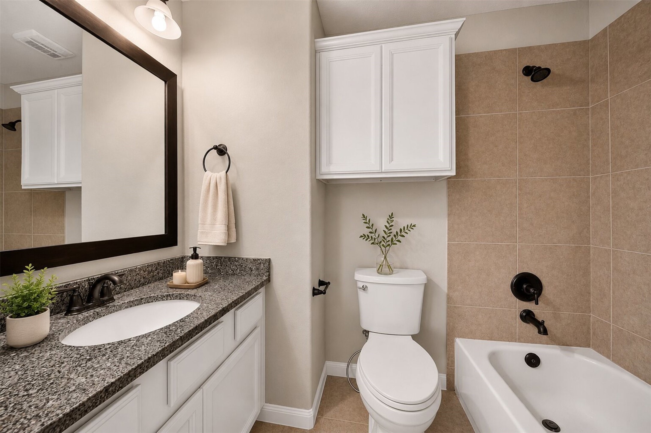 6234 Avon Landing Lane Spring, TX 77379 - Photo 33 of 49 This is the third bathroom which is upstairs, it has a tub / shower combo, a large vanity and plenty of storage.