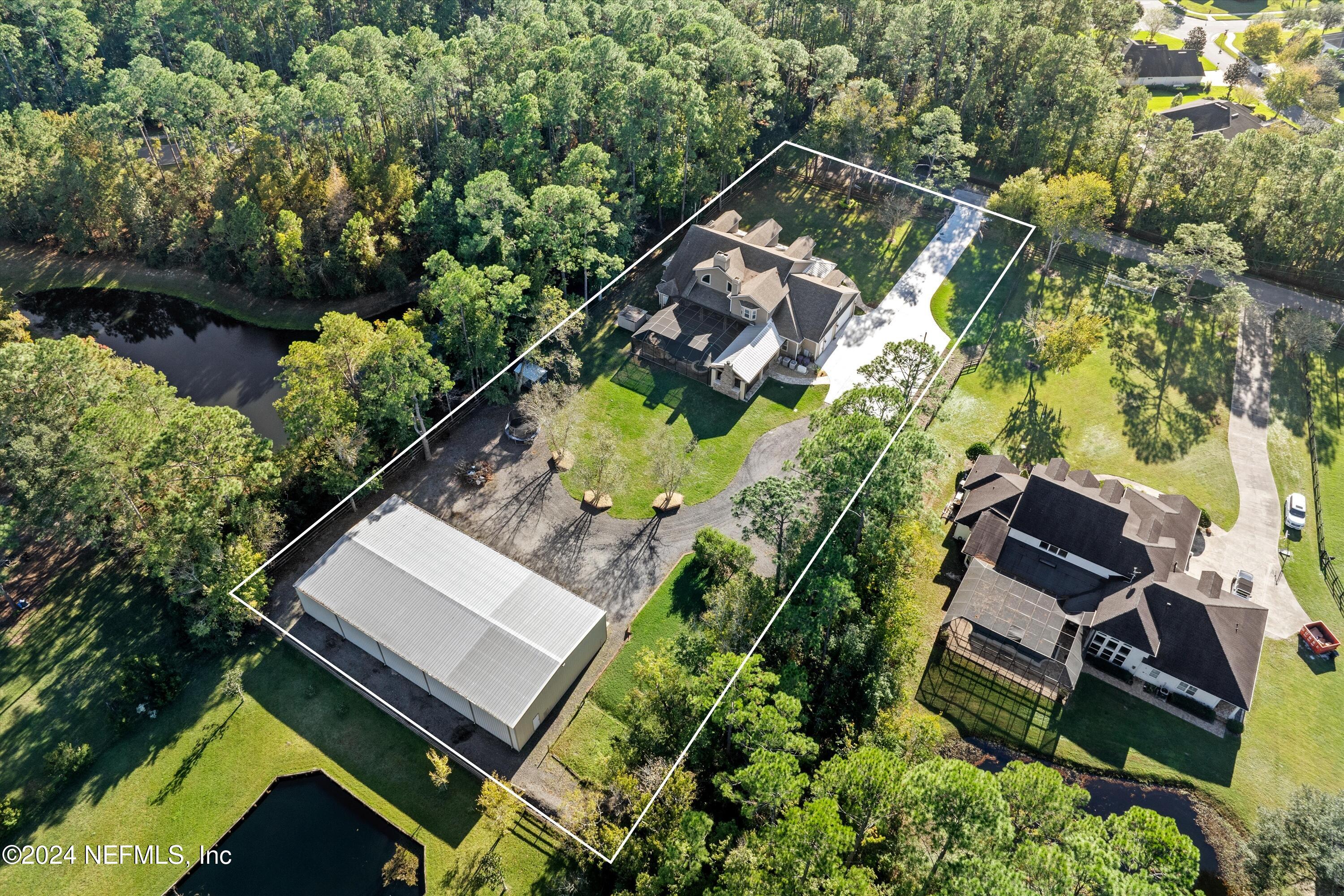 1315 Whispering Pines Road St. Johns, FL 32259 - Photo 3 of 44 51-Aerial Back