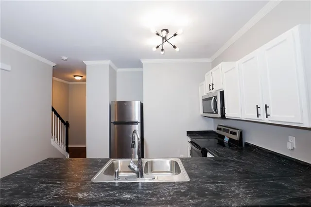 a view of a workspace with furniture