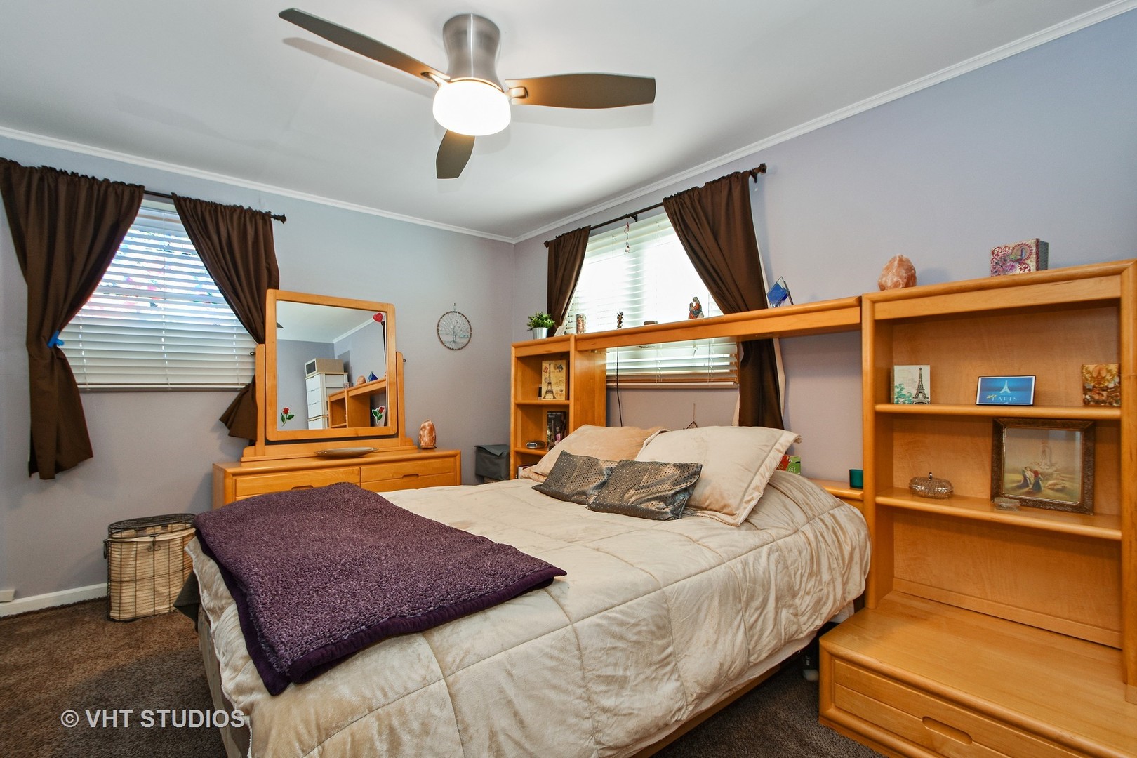 2160 Spruce Road Homewood, IL 60430 - Photo 6 of 10 a bedroom with a bed a dresser and book shelfs