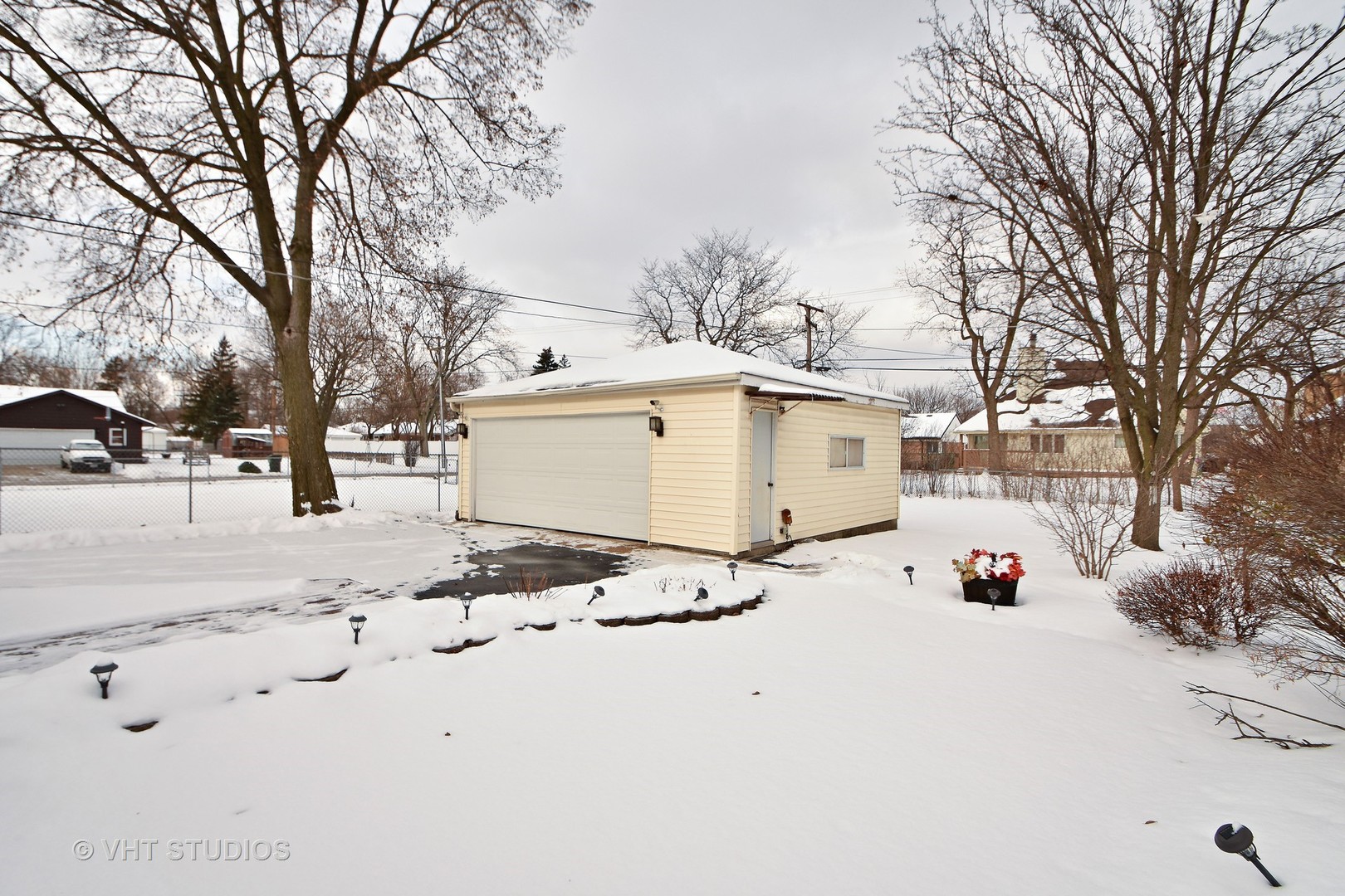 2160 Spruce Road Homewood, IL 60430 - Photo 10 of 10 a white house that has tree in front of it