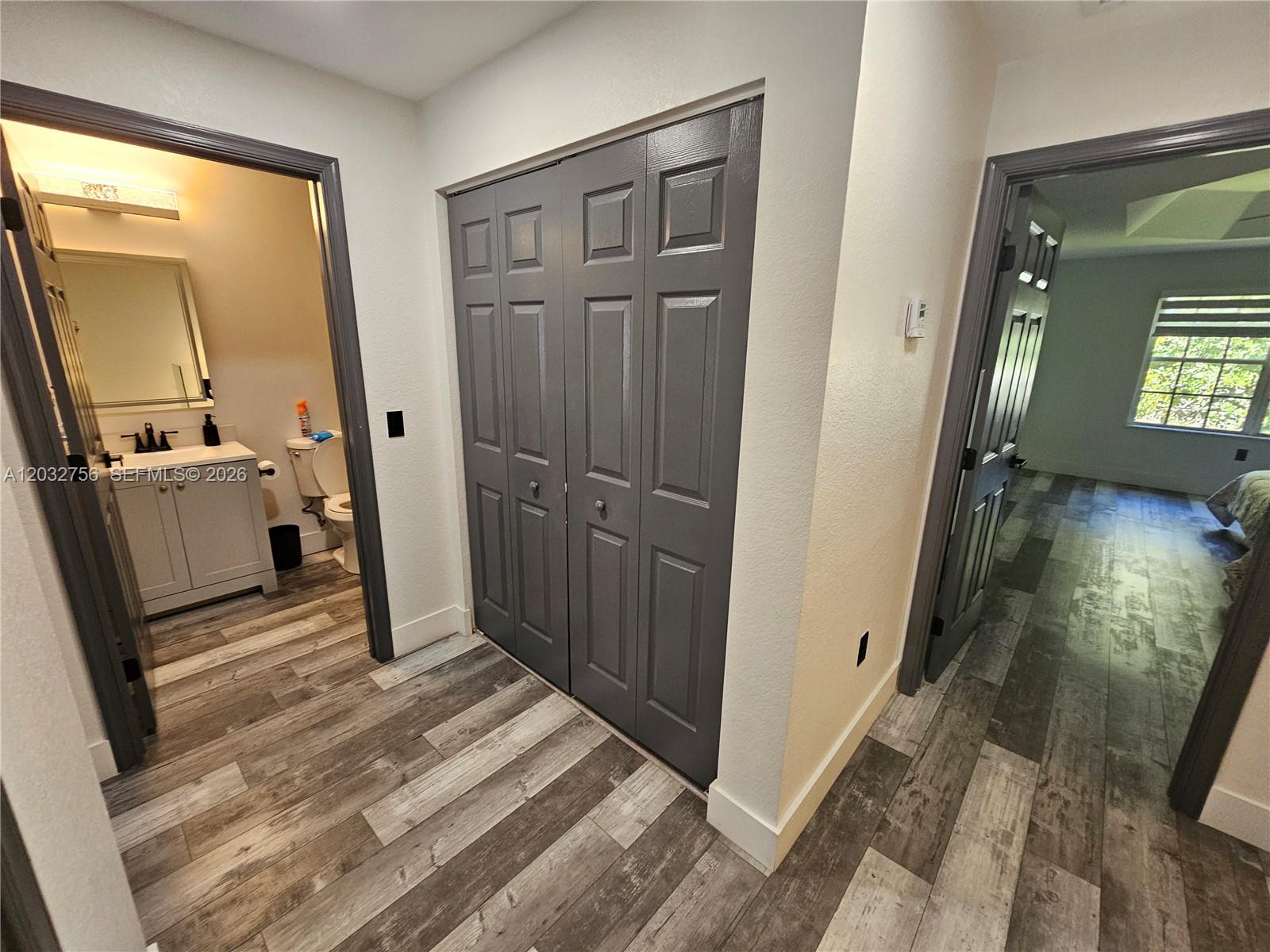 4331 Southwest 124th Way Miramar, FL 33027 - Photo 8 of 40 a view of a hallway and a livingroom with furniture