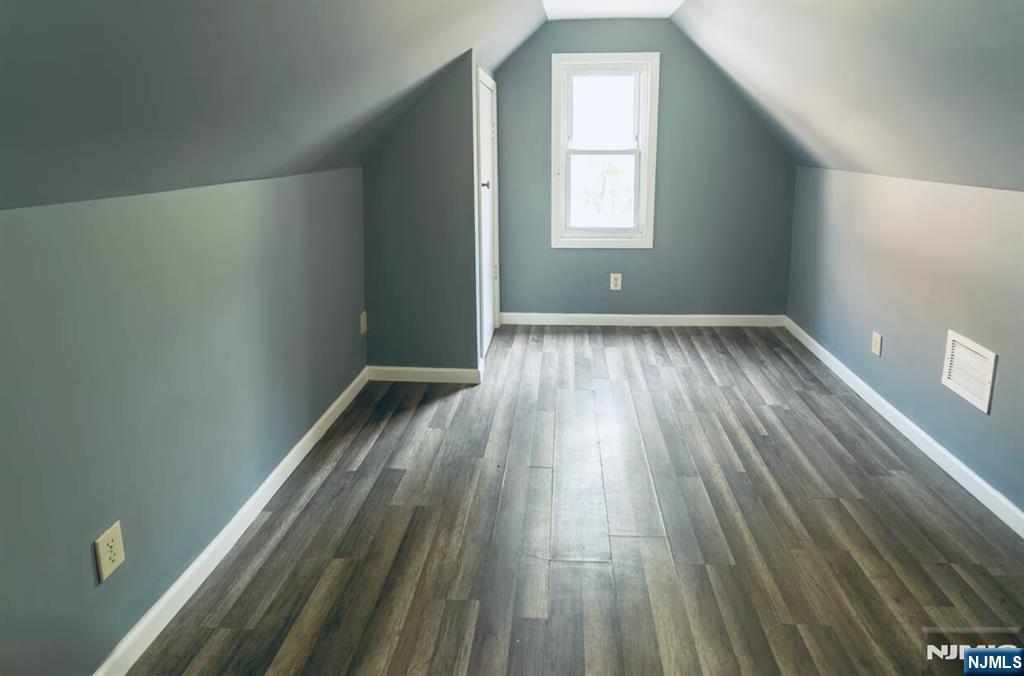 792 South 15th Street, Unit 2 Newark, NJ 07108 - Photo 7 of 10 a view of a room with wooden floor and window