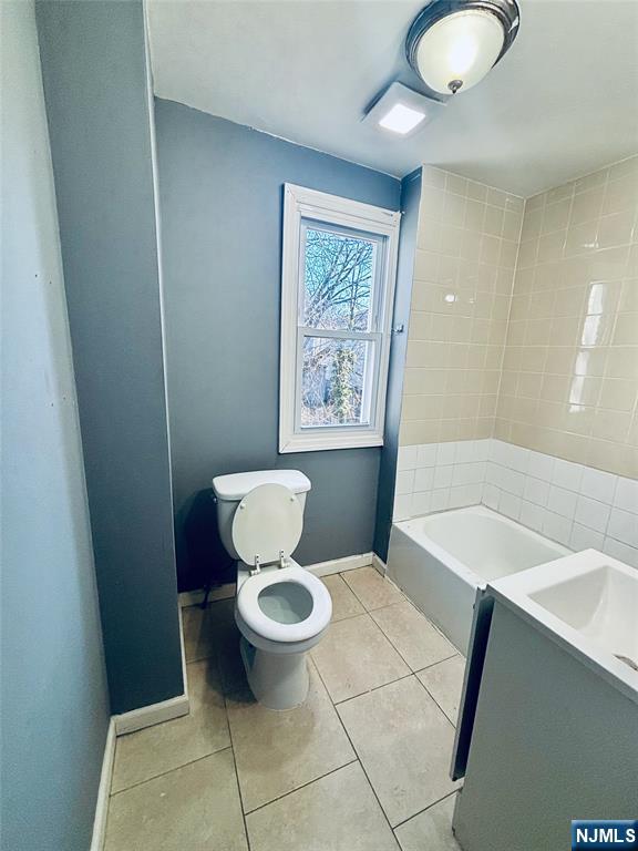 792 South 15th Street, Unit 2 Newark, NJ 07108 - Photo 9 of 10 a bathroom with a sink and a toilet