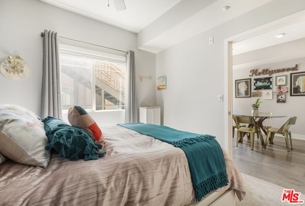 2972 Ripple Place, Unit 101 Los Angeles, CA 90039 - Photo 22 of 46 a bed sitting in a bedroom next to a window