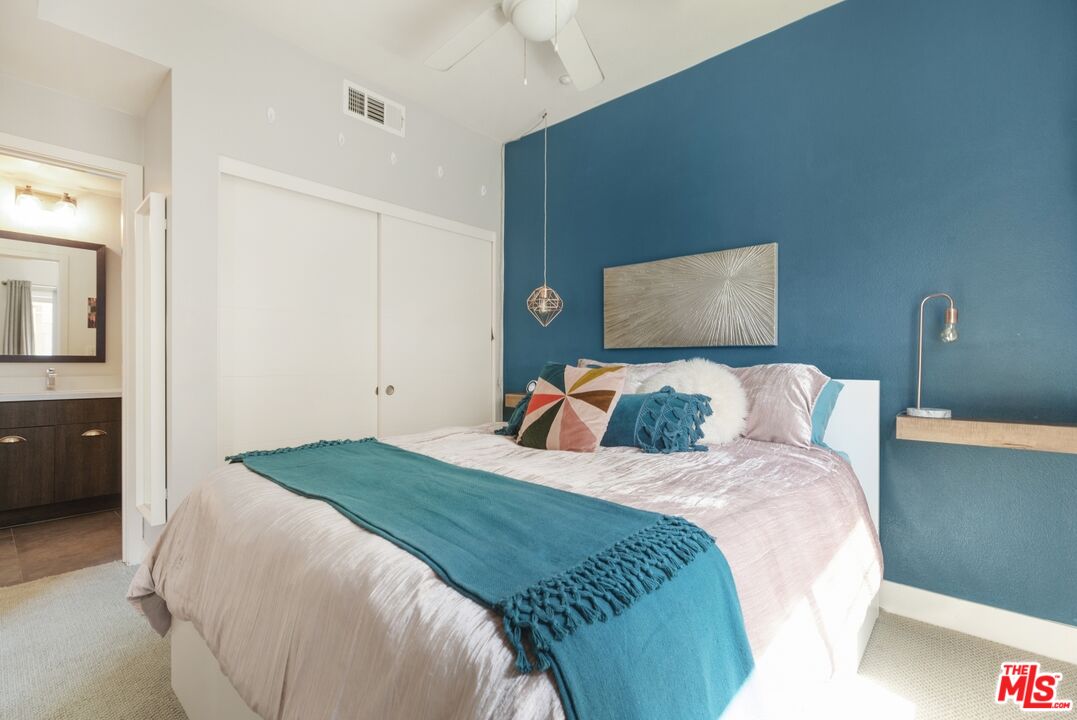2972 Ripple Place, Unit 101 Los Angeles, CA 90039 - Photo 23 of 46 a bed room with a bed and a night stand