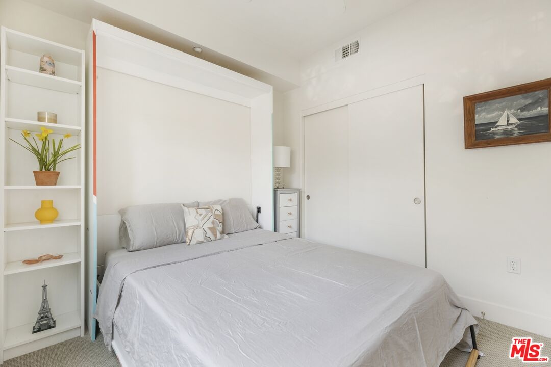 2972 Ripple Place, Unit 101 Los Angeles, CA 90039 - Photo 28 of 46 a bedroom with a bed and a window