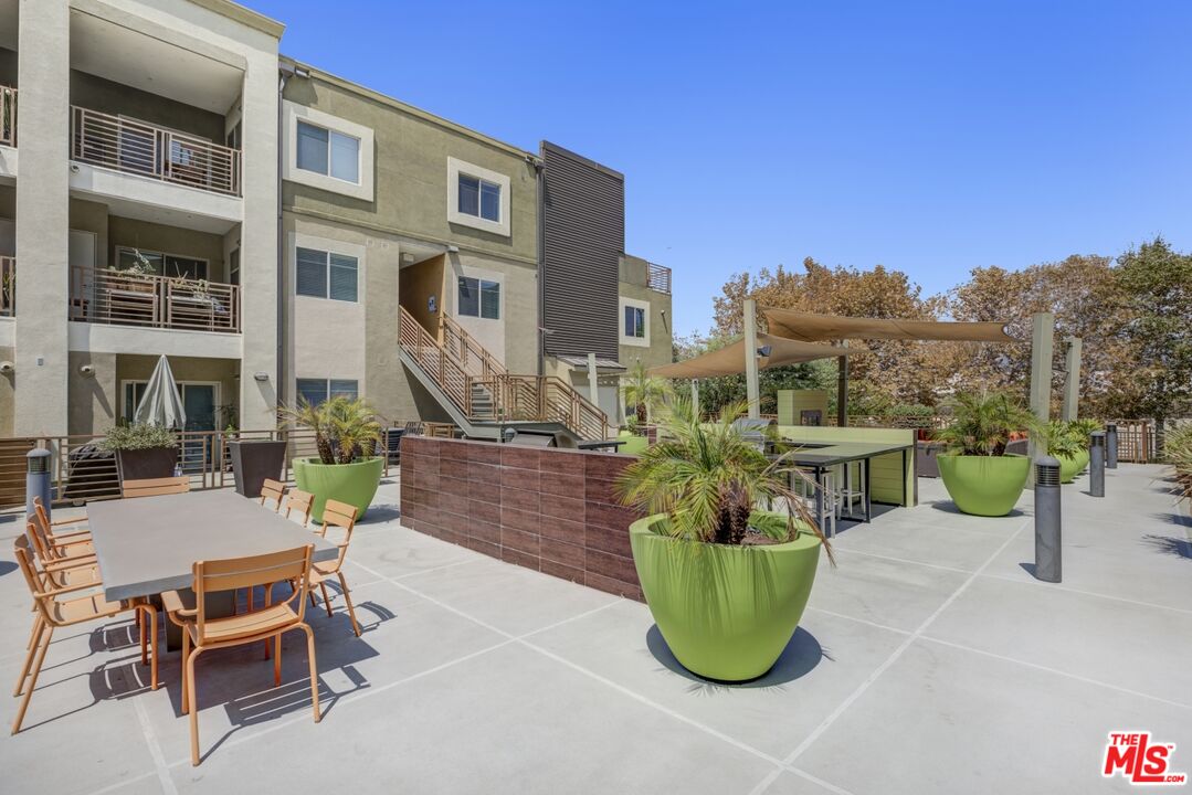 2972 Ripple Place, Unit 101 Los Angeles, CA 90039 - Photo 34 of 46 a view of a swimming pool with outdoor seating