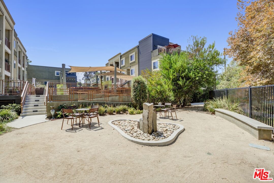2972 Ripple Place, Unit 101 Los Angeles, CA 90039 - Photo 40 of 46 a view of a house with sitting area and garden