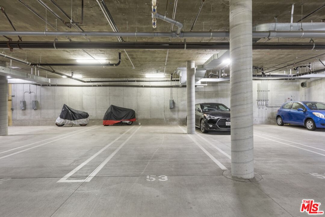2972 Ripple Place, Unit 101 Los Angeles, CA 90039 - Photo 43 of 46 a view of parking garage with cars