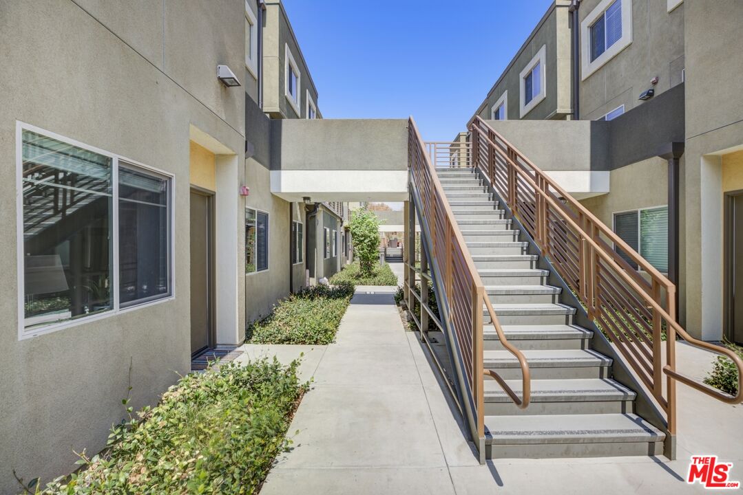 2972 Ripple Place, Unit 101 Los Angeles, CA 90039 - Photo 5 of 46 a view of a house with backyard and glass windows