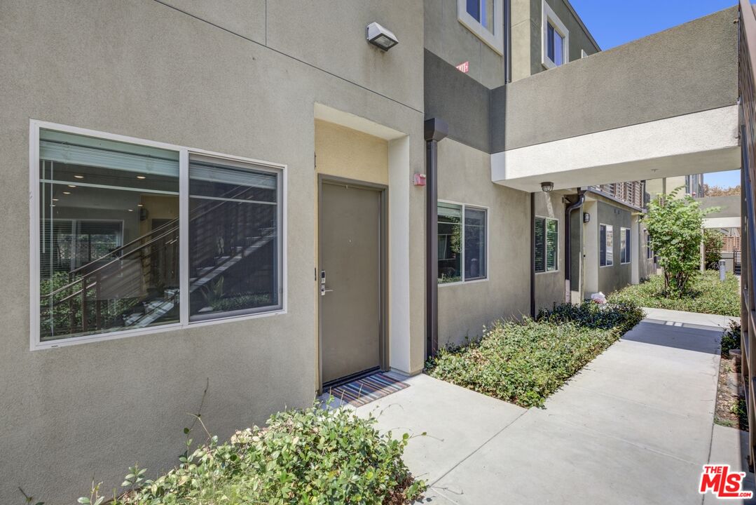 2972 Ripple Place, Unit 101 Los Angeles, CA 90039 - Photo 6 of 46 a front view of a house with a yard