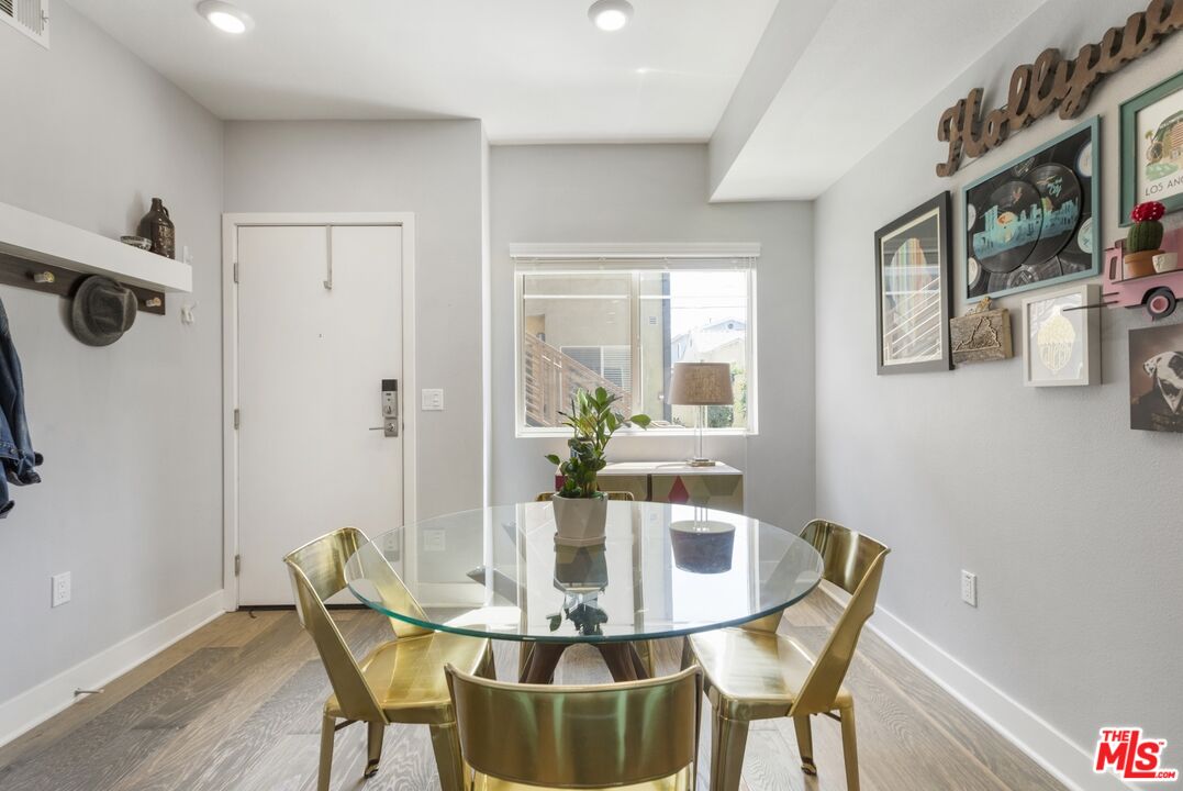2972 Ripple Place, Unit 101 Los Angeles, CA 90039 - Photo 9 of 46 a dining room with furniture and window
