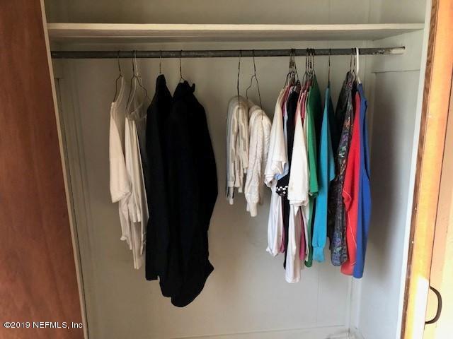 6153 Colgate Road Jacksonville, FL 32217 - Photo 12 of 25 a close up view of a walk in closet