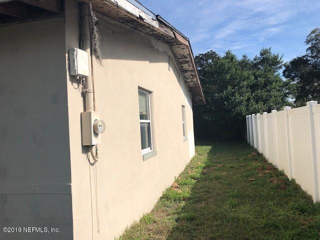 6153 Colgate Road Jacksonville, FL 32217 - Photo 21 of 25 a view of house with backyard