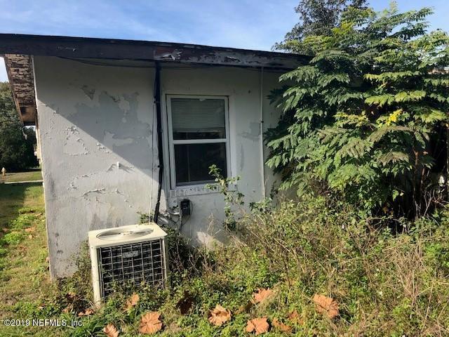 6153 Colgate Road Jacksonville, FL 32217 - Photo 24 of 25 a backyard of a house with outdoor seating